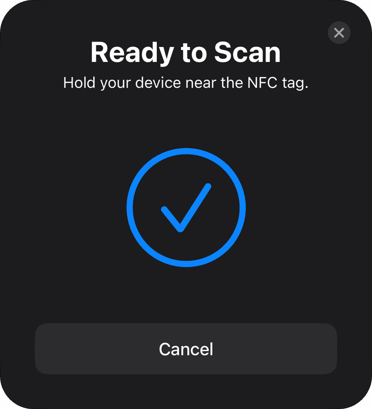 Mobile graphic showing NFC Scanning modal in successful state
